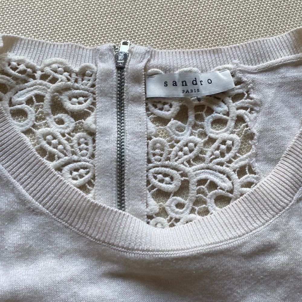Beige Sandro sweater with patterned cutout back